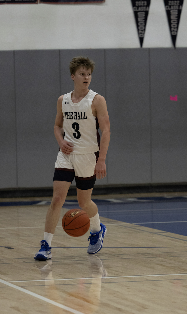 Senior Will Malko Dribbles The Ball Up The Court